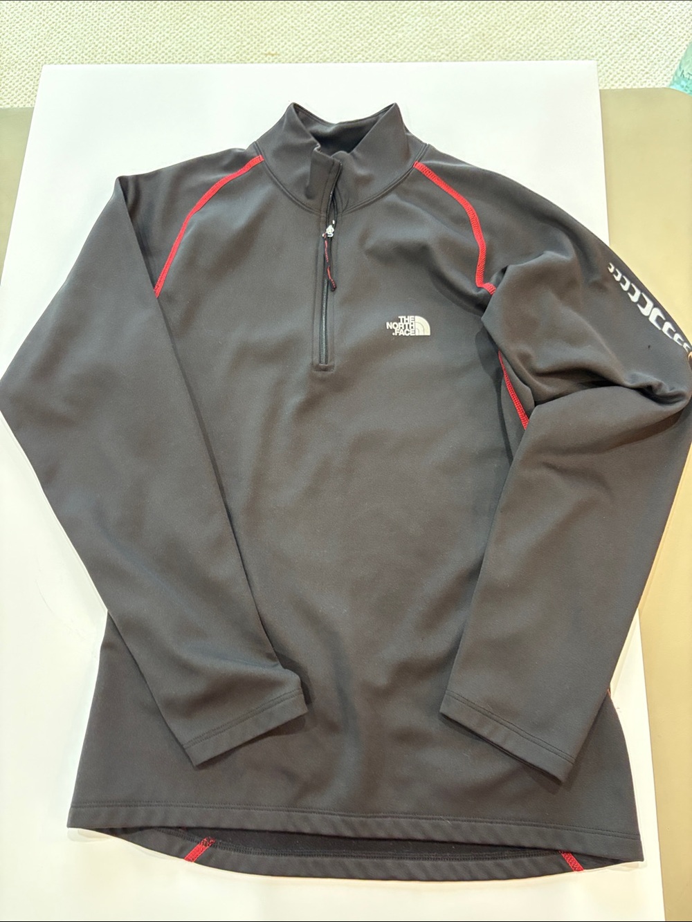 The North Face Black Half-Zip Pullover with Red Stitching